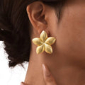 Gold coated flower earrings