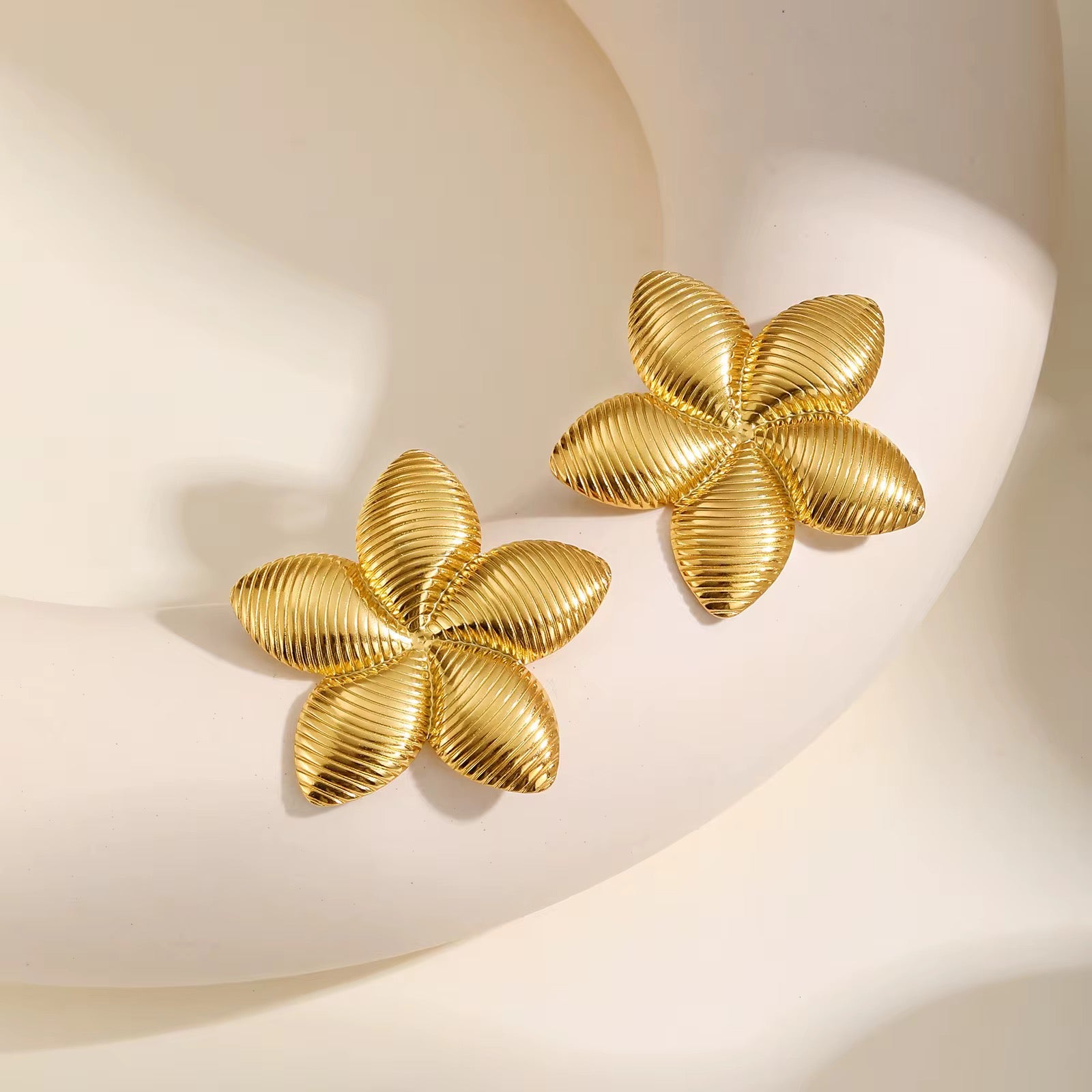Gold coated flower earrings
