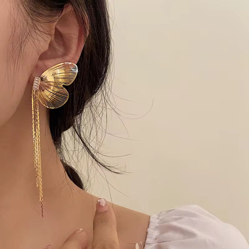 Half butterfly Gold earrings